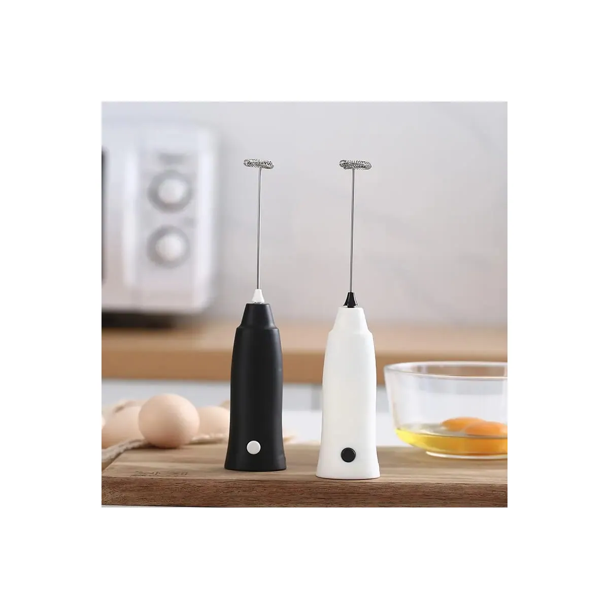 Handheld Electric Milk Frother & Egg Beater in use